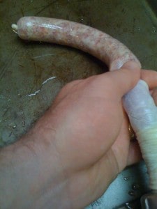 Sausage going into the casing.