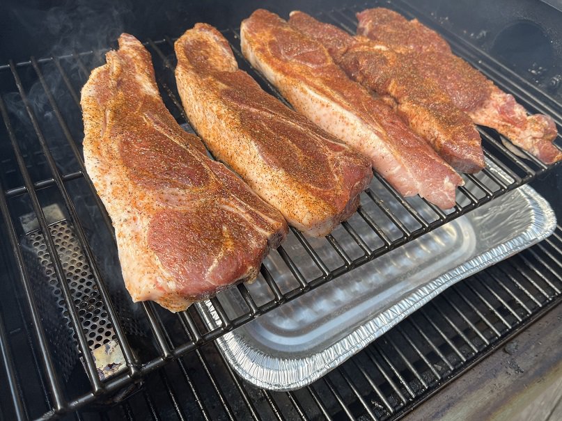 Seasoned Country Style Ribs on Pellet Smoker Cooking Grate